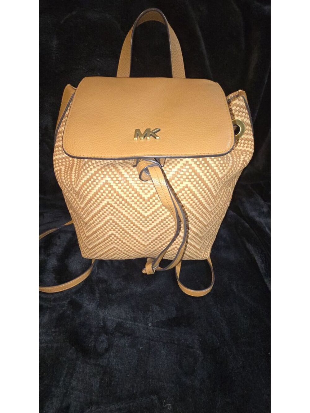 60. Michael Kors Junie Leather Woven Basket Backpack